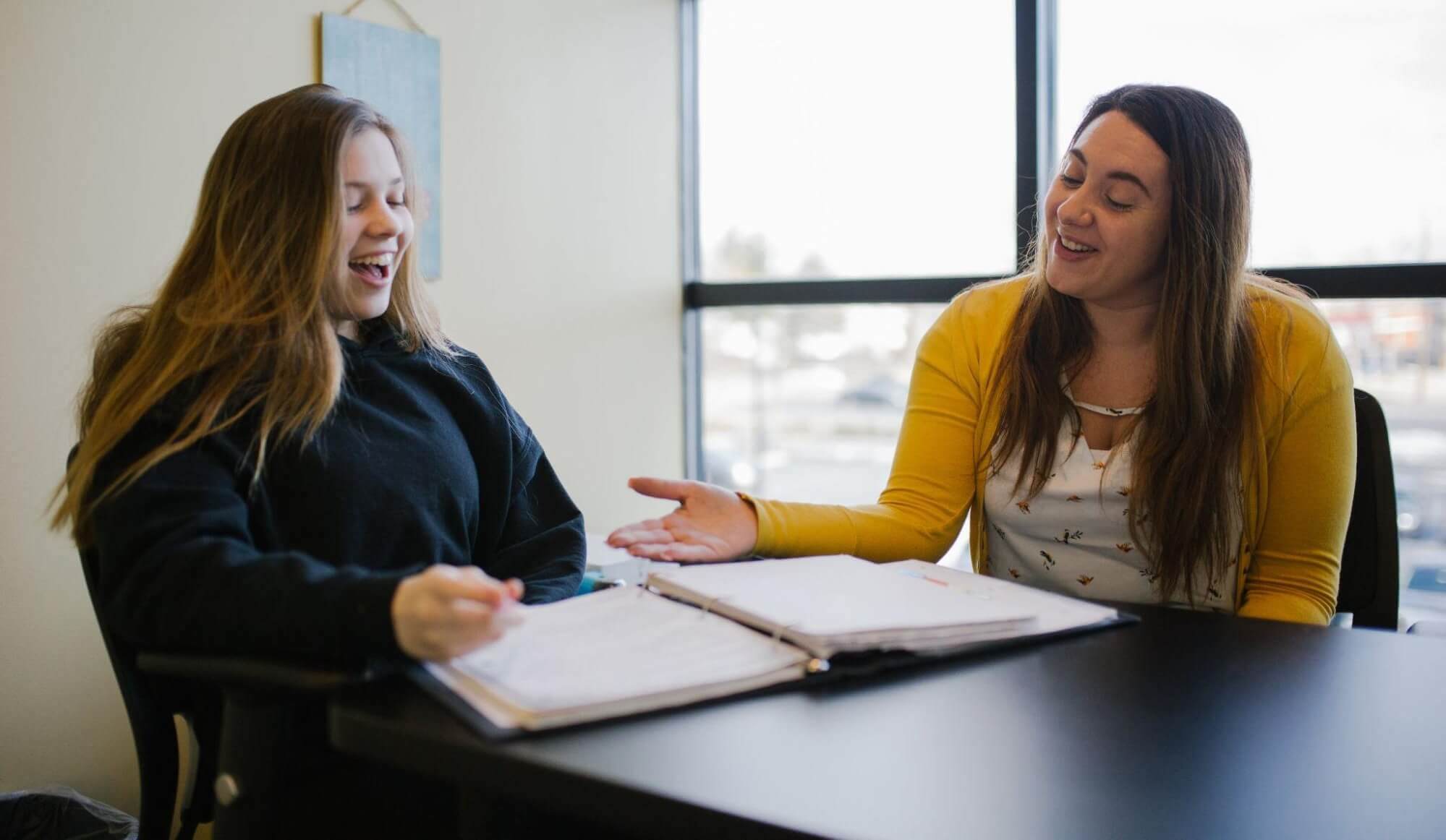 Fusion Academy Teacher and Student Studying